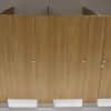 Floor-mounted toilet partitions offer stylish minimisation in commercial bathrooms.
