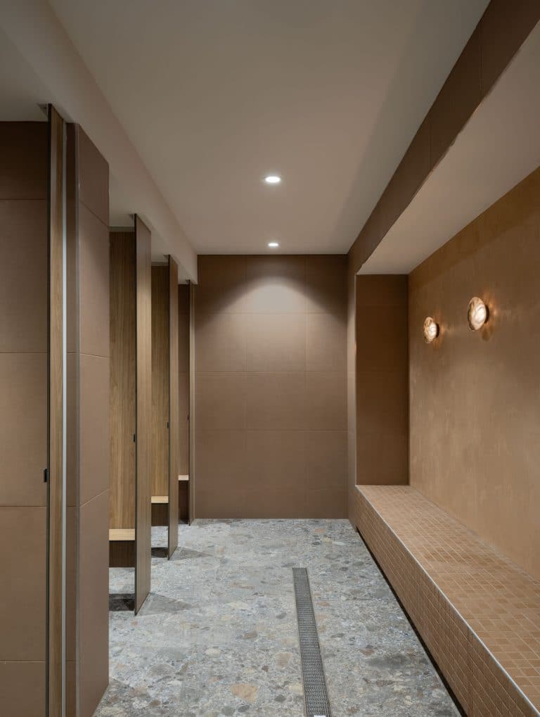 Floor mount ceiling fixed compact laminate toilet partitioning system at Adelaide Aquatic Centre